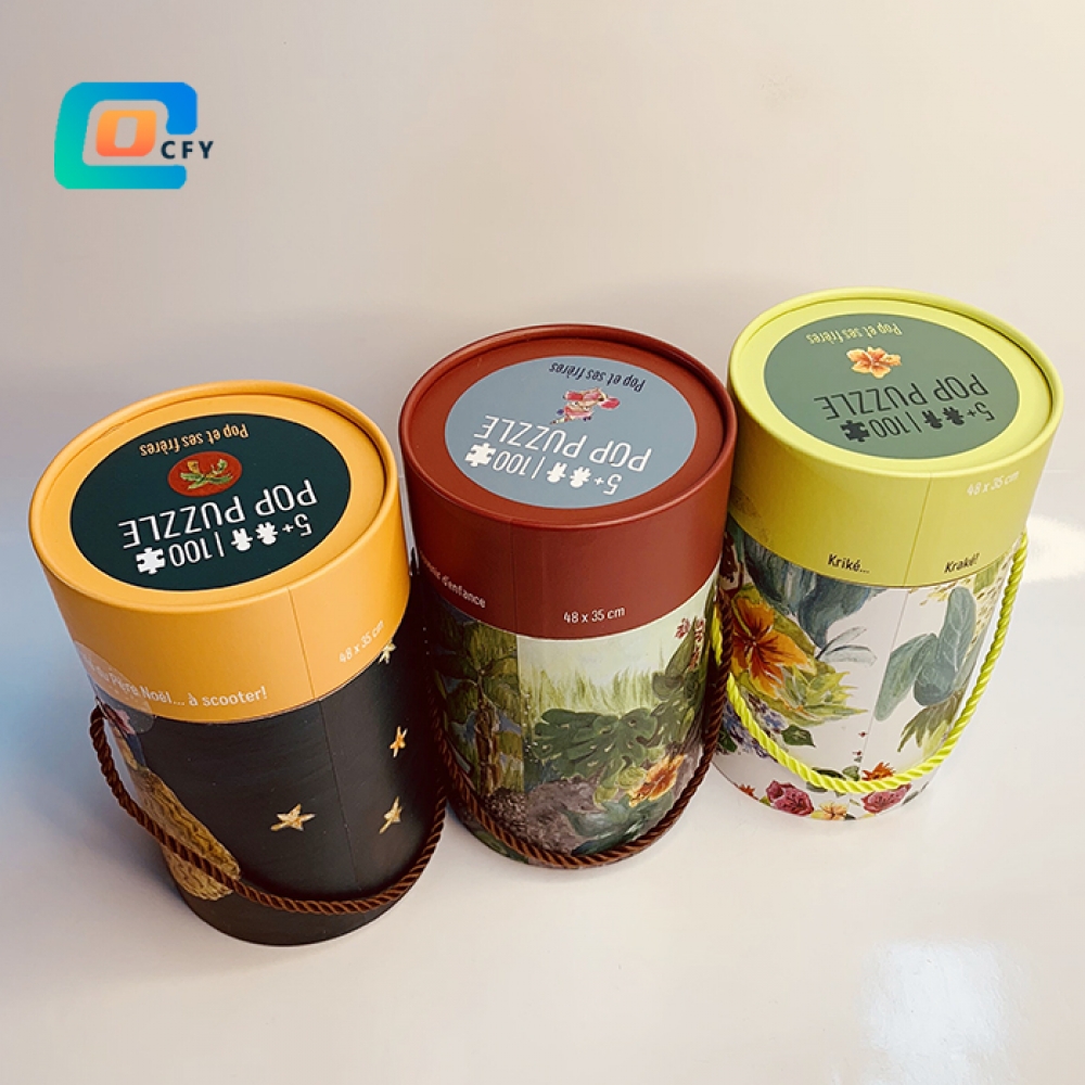 Custom wholesale 100 pieces Jigsaw puzzle round tubes Lecture Baignade Scooter puzzles Personalized paper kids puzzles in cylinder