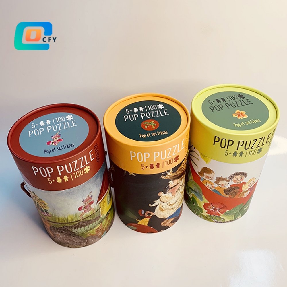 Custom wholesale 100 pieces Jigsaw puzzle round tubes Lecture Baignade Scooter puzzles Personalized paper kids puzzles in cylinder